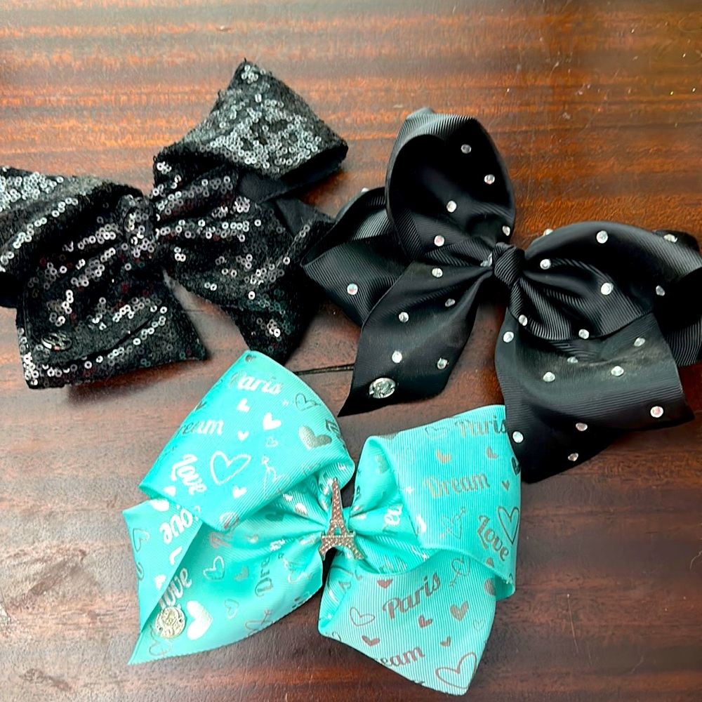 Black Sparkle and Teal Paris Jojo Siwa bows.